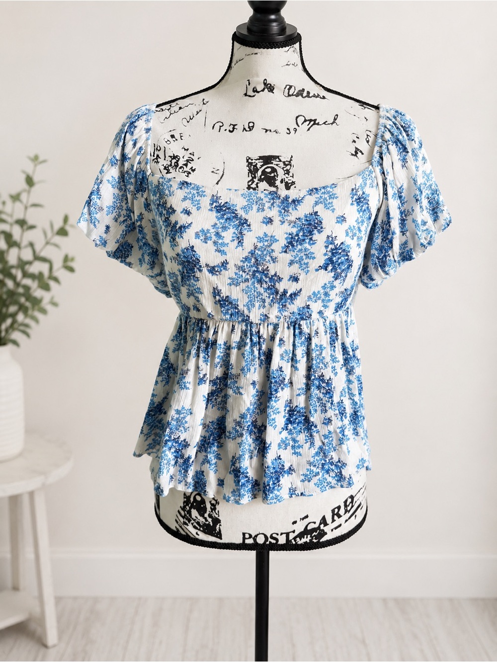 Rolla Coster Blue Floral Peplum Top Bow Back